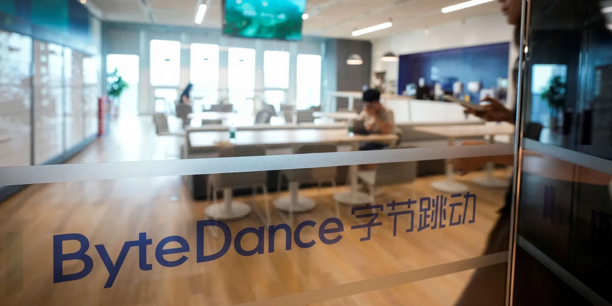 ByteDance logo on the glass wall of an office