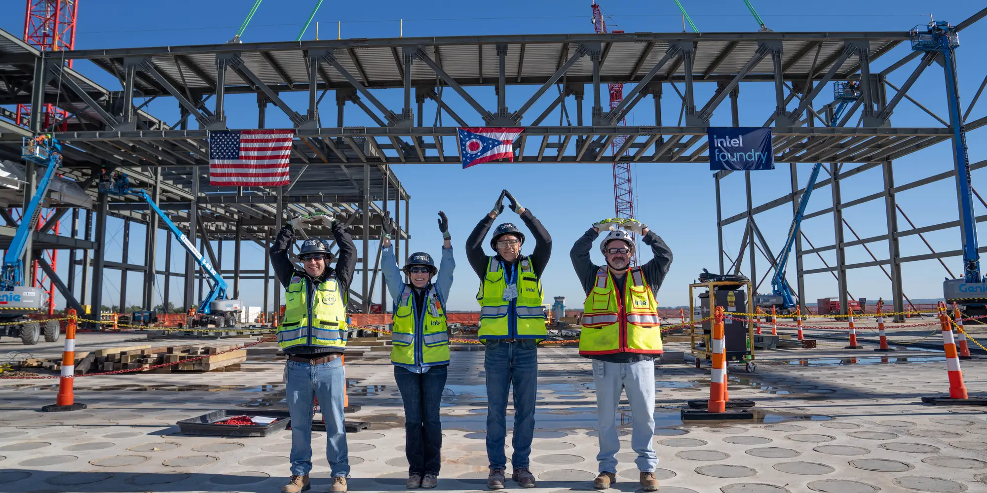 Workers under the first structural truss at Intel's Ohio One fab site in New Albany