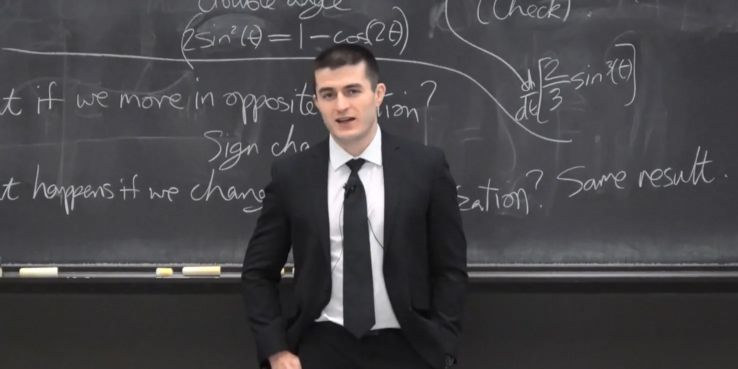 Lex Fridman lecturing at an MIT chalkboard