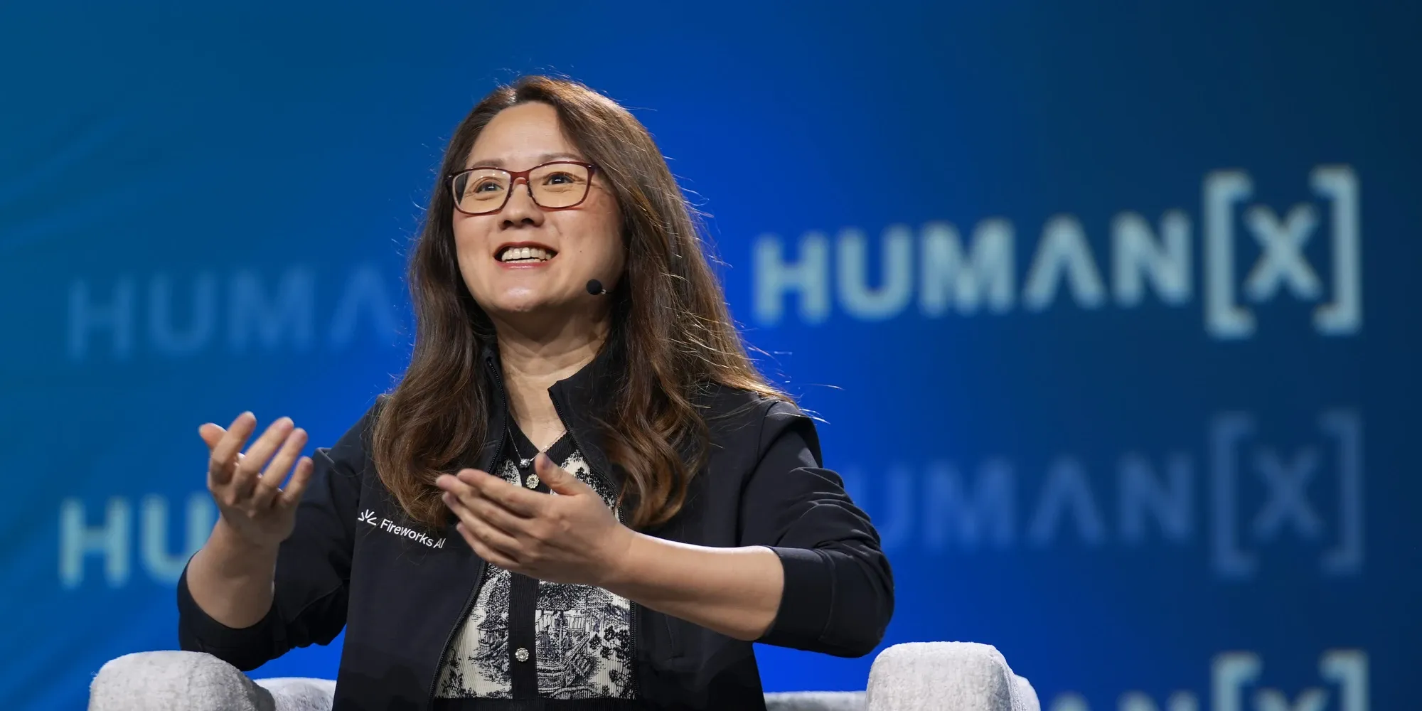 Fireworks AI chief executive Lin Qiao speaking on stage at HumanX