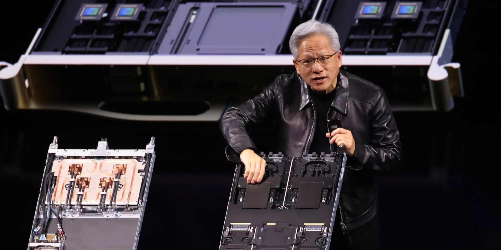 Jensen Huang shows Vera Rubin compute modules on stage at Nvidia GTC in Berlin