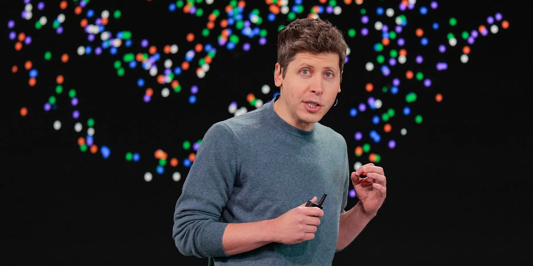 Sam Altman speaking on stage