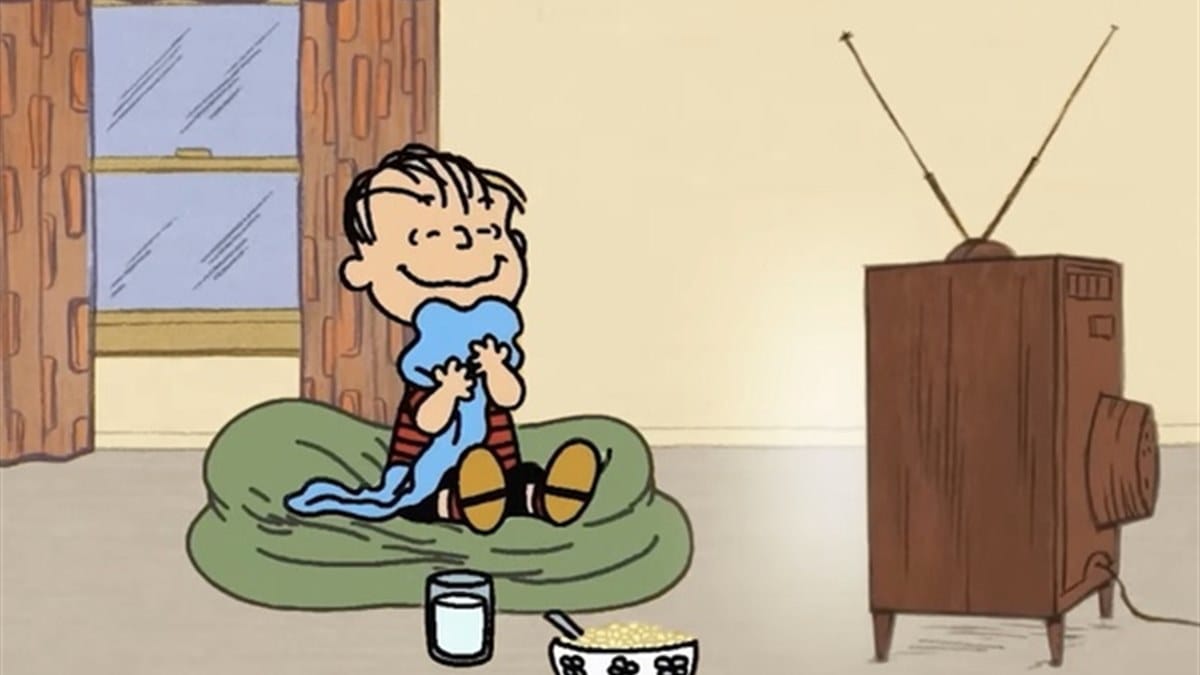 Linus and his blue blanket in the Snuggle and Peanuts campaign